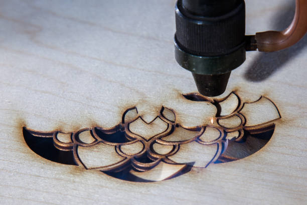 istock The laser cuts out a tree in the form of a mandala 906963230