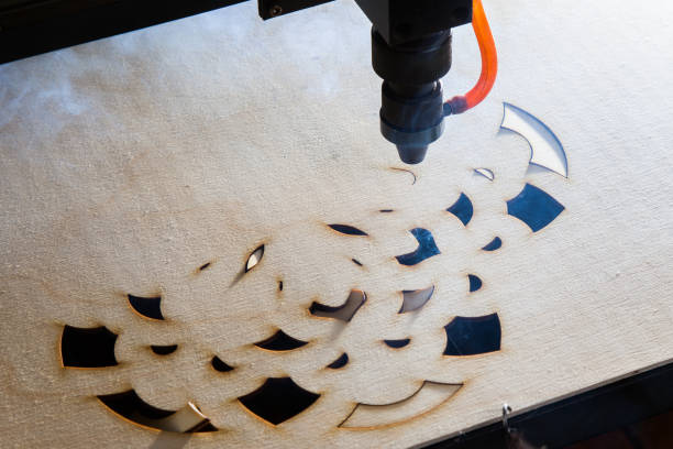 istock The laser cuts out a tree in the form of a mandala 906964260
