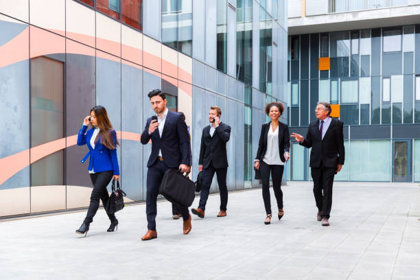 istock Business people walking on a street 906964486