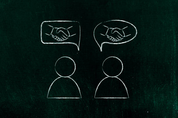 istock meeting people & agreeing: men with handshake into comic bubbles 906972438