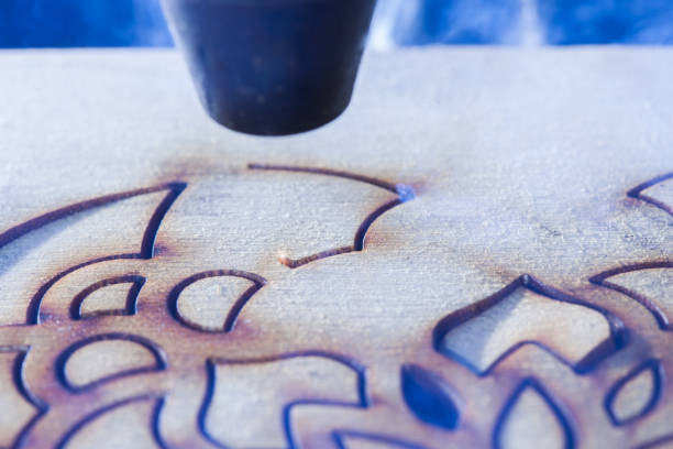 istock The laser cuts out a tree in the form of a mandala 906994984
