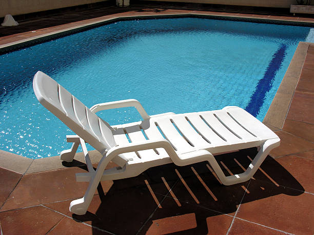 Chair at a pool 2 stock photo