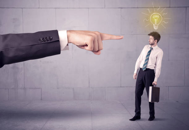istock Boss blaming sales person with an idea 907006640