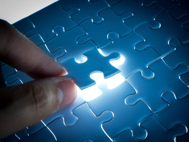 istock Missing Jigsaw puzzle piece with lighting, business concept for completing the finishing puzzle piece 907012308