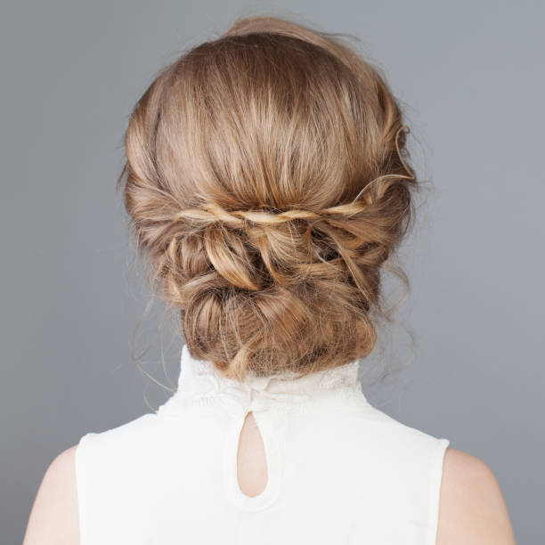 istock Female Back. Bridal or Prom Hairstyle 907014502