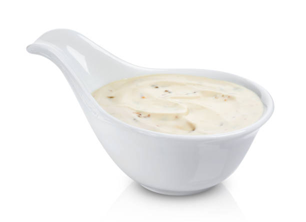 istock Sour cream with mushrooms. Mushroom sauce isolated on white background 907034410