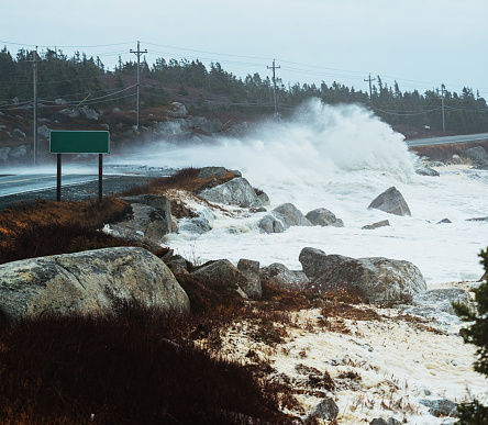 Heavy seas associated with 'Winter Storm Grayson' wash over Route 333 near Peggy's Cove.