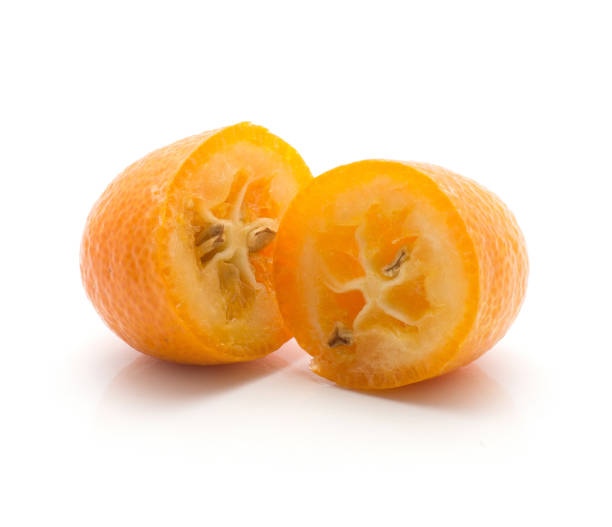 istock Fresh raw kumquat isolated on white 907048020