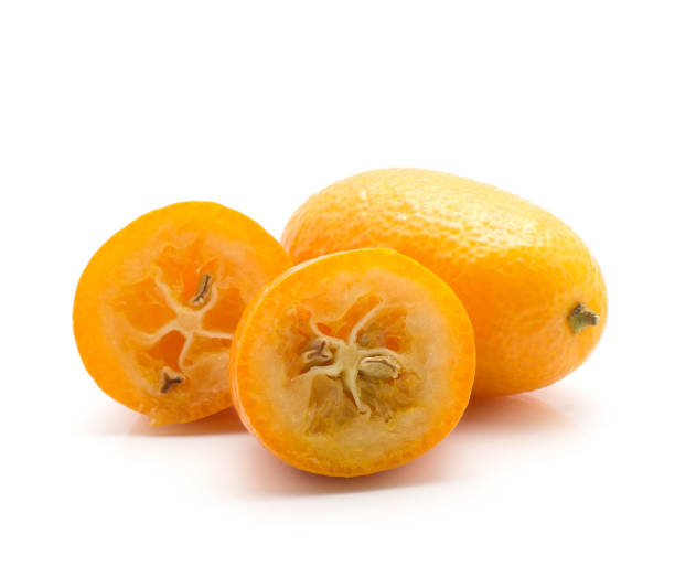 istock Fresh raw kumquat isolated on white 907048412