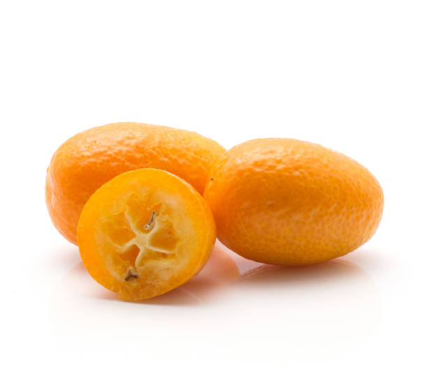 istock Fresh raw kumquat isolated on white 907048510