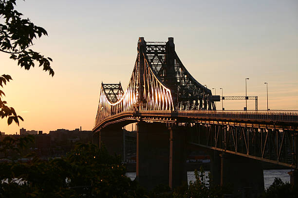 Montreal's Pont Jacques-Cartier elevated view on a clear Winter day with light traffic crossing it.