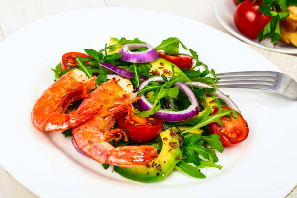 istock Fresh vegetable salad with shrimps 907058608