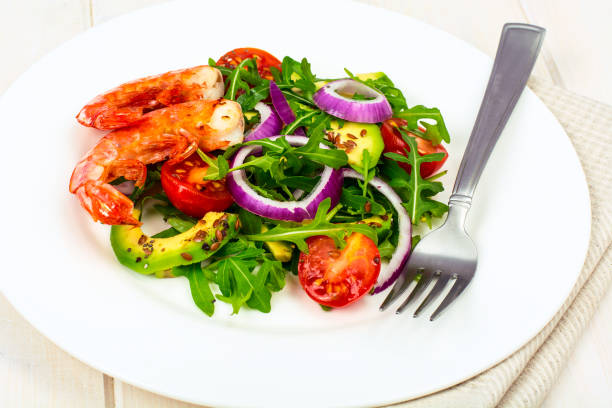 istock Fresh vegetable salad with shrimps 907058758