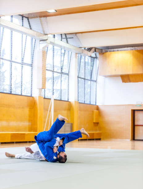 istock Martial Artisti In Judo Competition 907067550