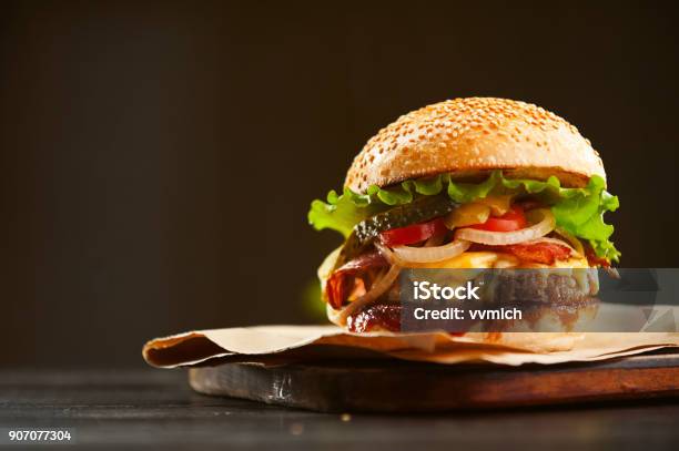 Mouthwatering Delicious Homemade Burger Used To Chop Beef On The Wooden Table Stock Photo - Download Image Now