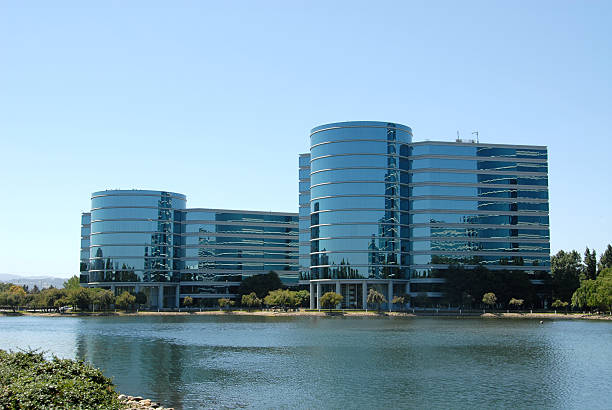 Bright modern office buildings next to a lake stock photo
