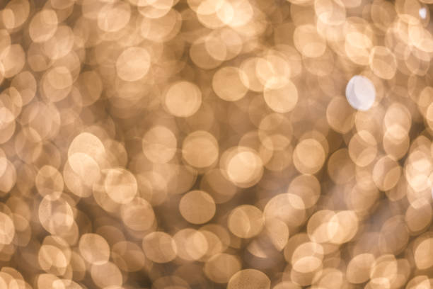 istock Abstract background of blurry bright lights from flashlights 907078470