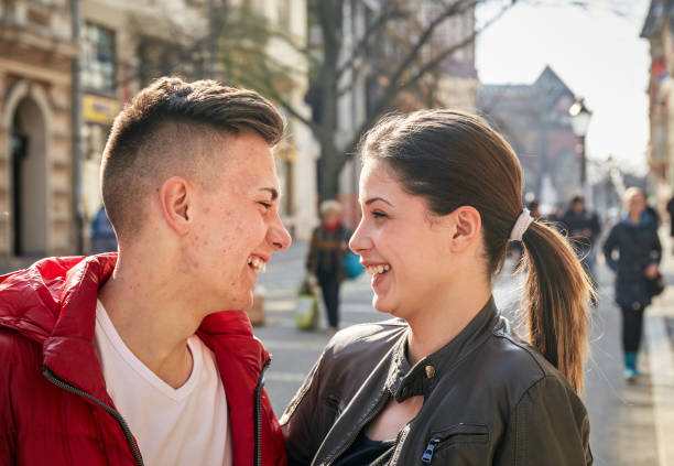 young couple lovers street in spring