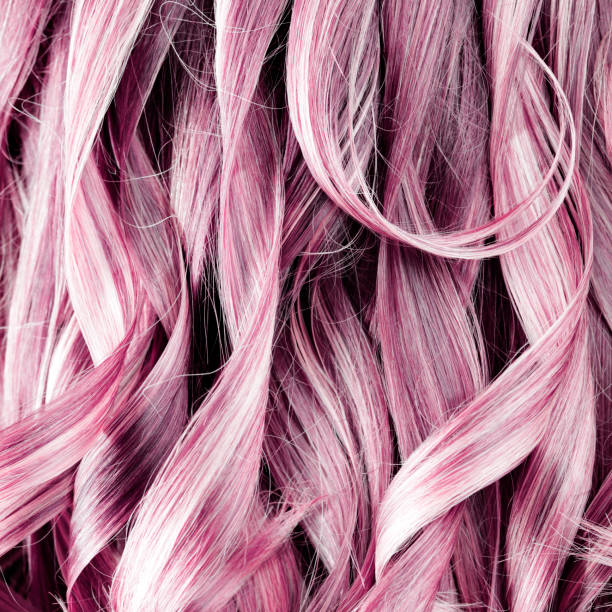 istock Pink Curly Hair Background 907207554