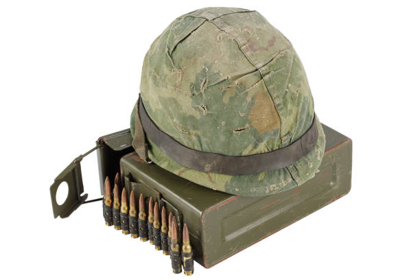 istock Green Ammo Box with ammunition belt and helmet 907208322
