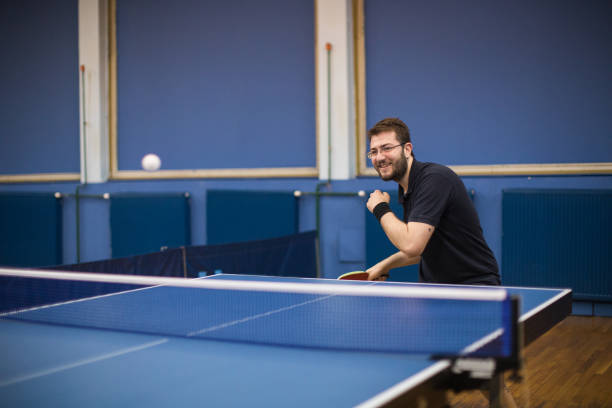 istock Table tennis player playing indoors 907215498