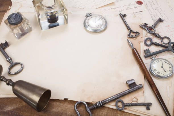 istock old papers and pen with vintage pocket watch 907216652