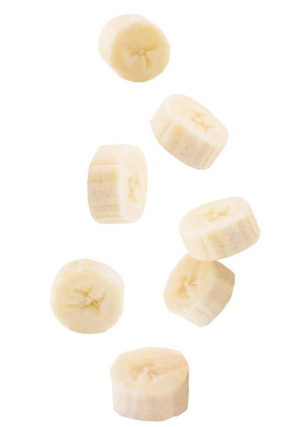 istock Falling sliced banana isolated on white 907248572