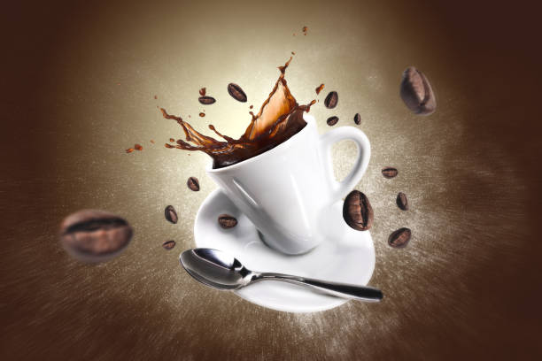 Explosion of coffee with a cup and beans