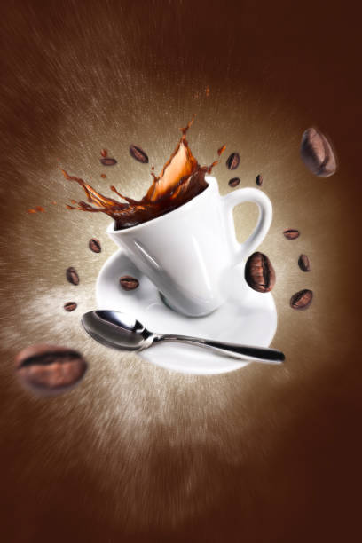 istock Explosion of coffee with a cup and beans 907253298