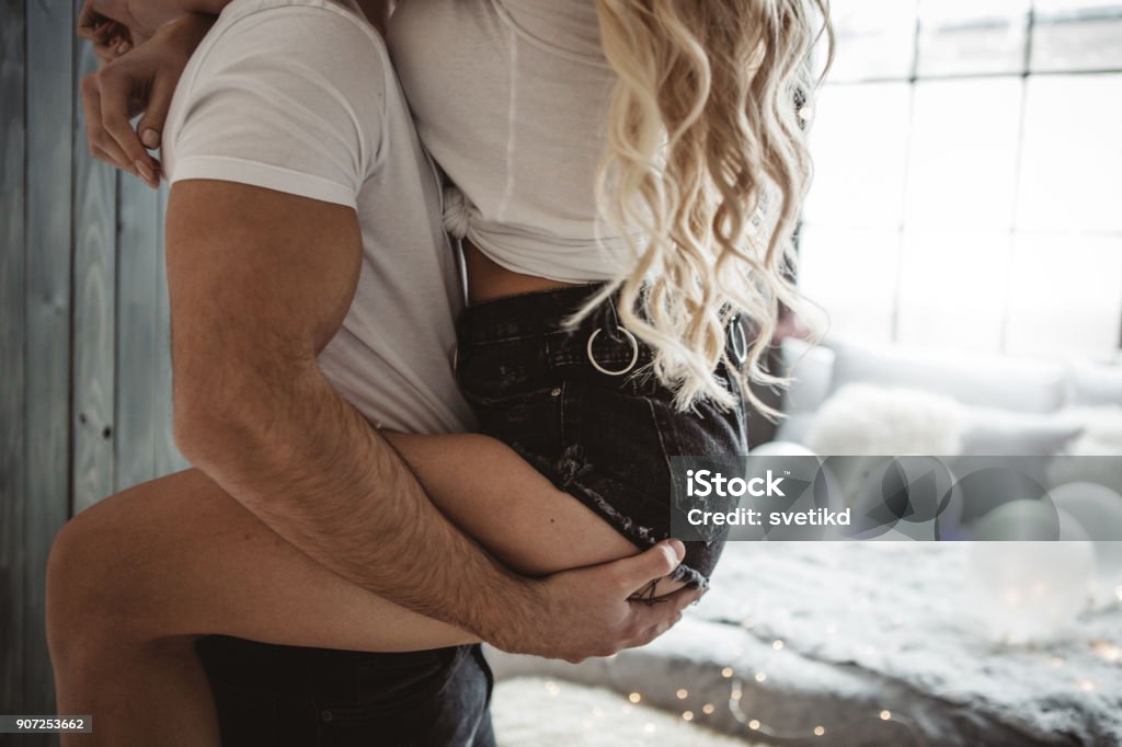 Sensual love Couple on Valentine day enjoy in love. They are in bed and having romantic moment together Sensuality Stock Photo