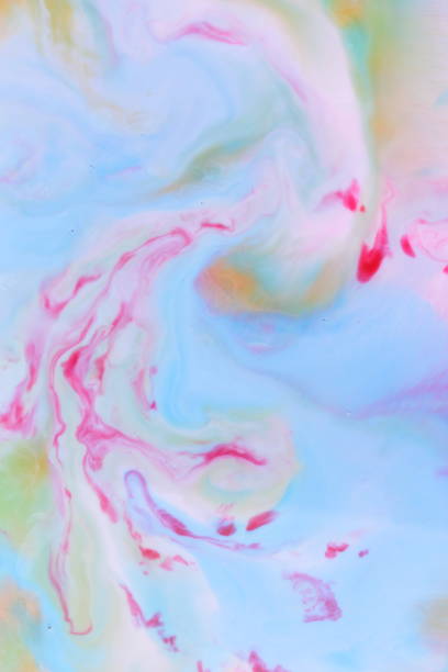 istock Multicolored abstract background on liquid, multicolored minimalistic background, pop art pattern, pastel texture for designer, background preparation, color divorce on milk 907262386