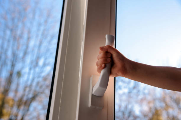 closed plastic vinyl window and child hand child hand opens plastic vinyl window on a background blue sky outhouse interior stock pictures, royalty-free photos & images