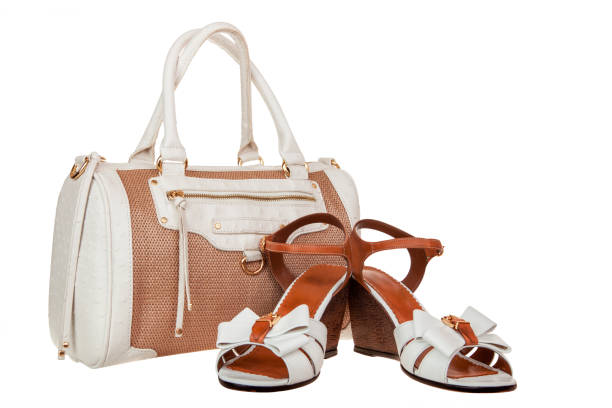 istock Summer woman bag and sandals on white 907274408