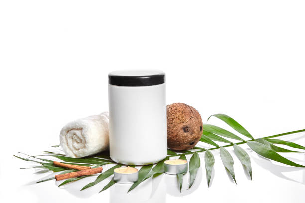 istock Organic cosmetics with coconut on white background 907292314