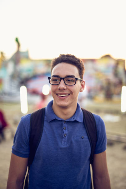 istock Portrait of a boy at amusement park 907306176
