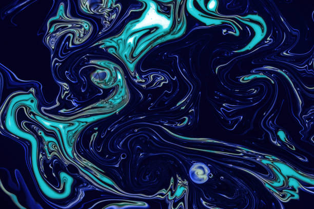 istock Swirling Oil Paint Abstract Toxic Hazard 907335328