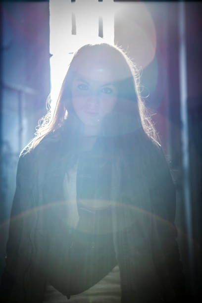 istock Girl in a grunge room 907337488