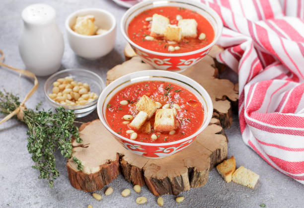 istock Delicious hot or cold tomato soup with croutons 907337916