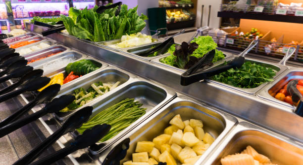 istock Salad bar in supermarket 907369974
