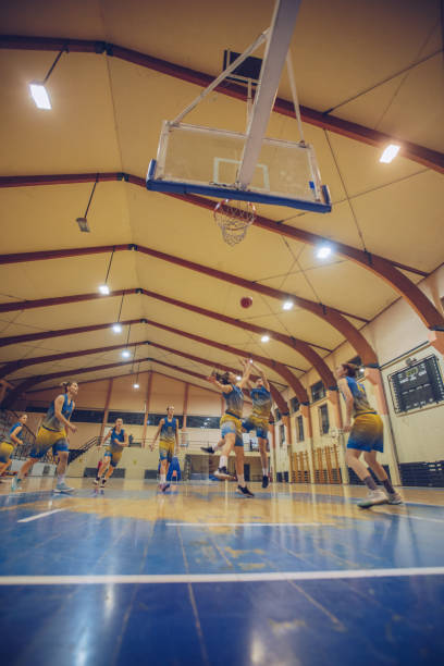istock Woman basketball players playing game 907383336