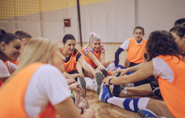 istock Young women volleyball players 907386132