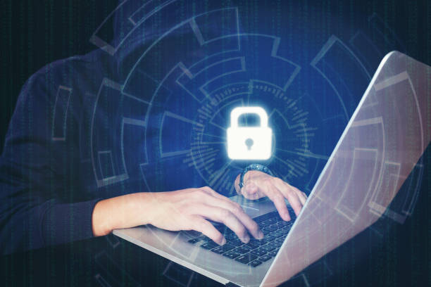 istock Businessman hand using laptop with Cyber security job business and network server concept 907391162