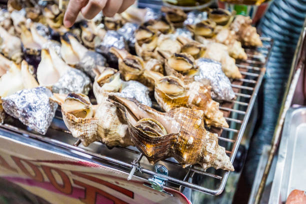 istock roasted conch in taipei 907398656