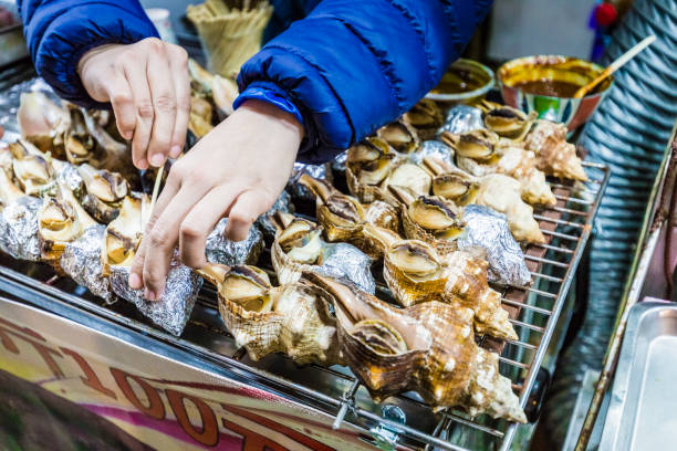istock roasted conch in taipei 907398904