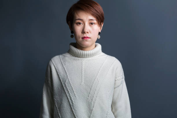 istock young asian female,portrait 907406418