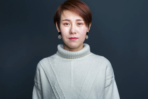 istock young asian female,portrait 907406426