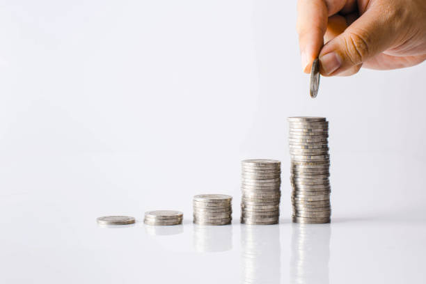 istock Place a coin on the Pile 907408698