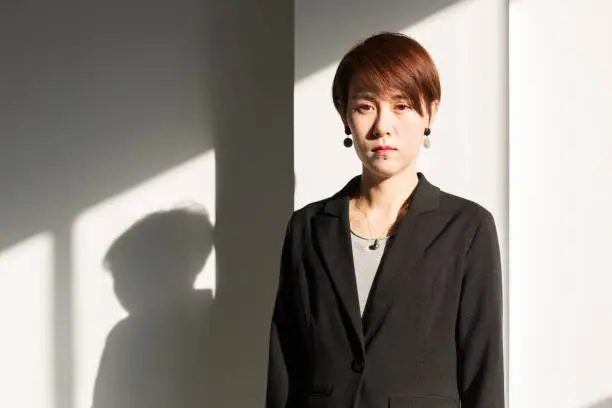 shadow of young businesswoman,portrait.