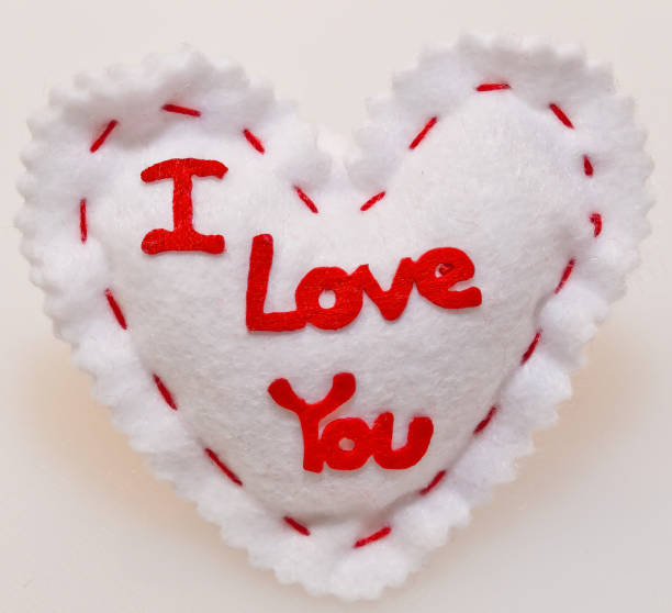 istock A white heart with I Love You written on it 907425472