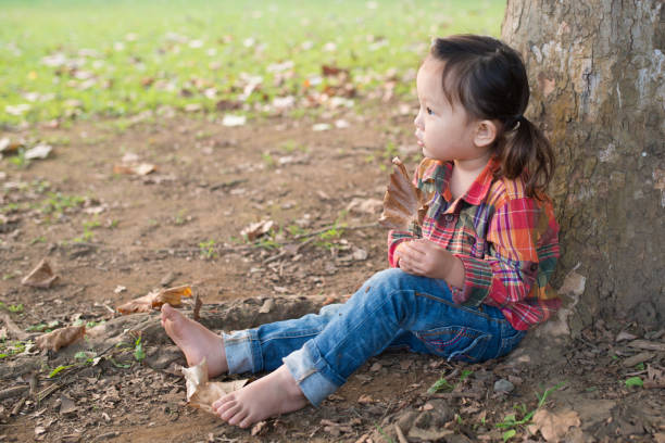 istock Barefoot Little Girl 907440360